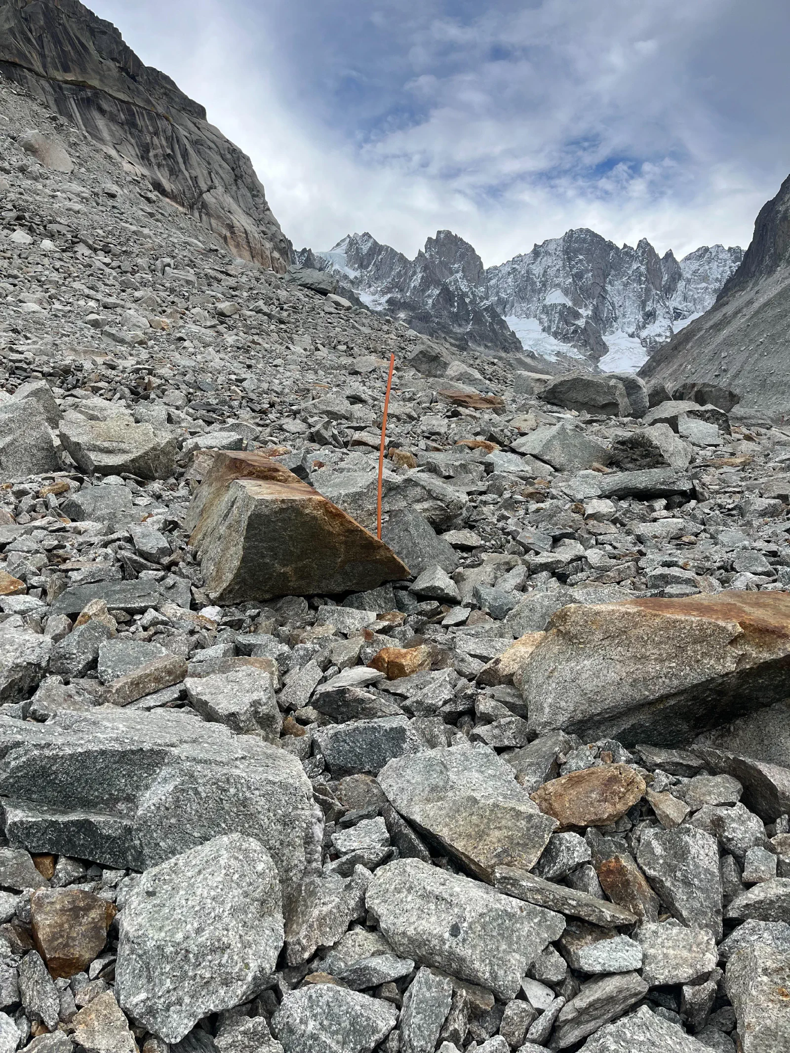 Orange pole on a glacier
